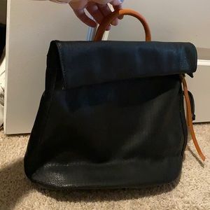 NWOT black purse backpack